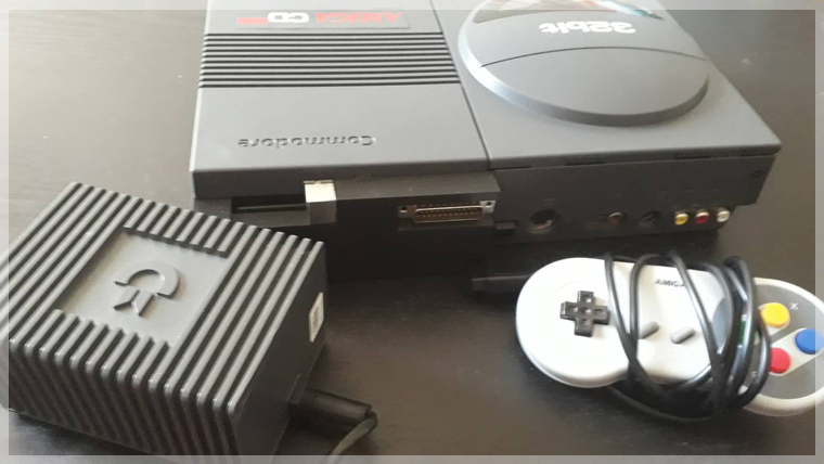 CD32 with a CD32 RISER plus the original PSU and a third-party controller -Photo from my collection CD32 with a CD32 RISER plus the original PSU and a third-party controller -Photo from my collection